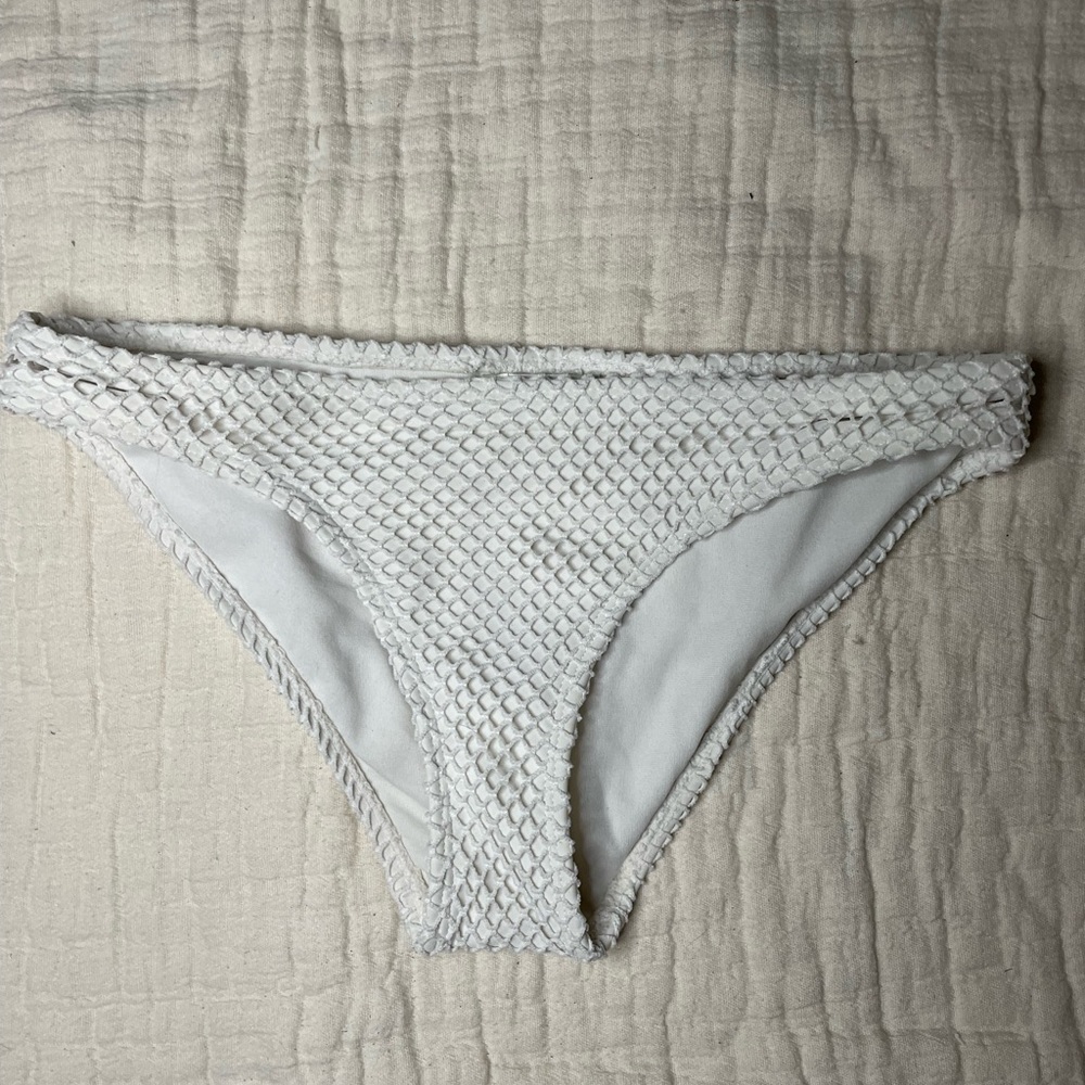 White and white mesh swim bottoms